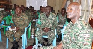 The Deputy Contico Lt Col Frank Tumwesigye seated with the staff officers attending the welcome ceremony at the contingent Hq 768x512 1 660x330 1
