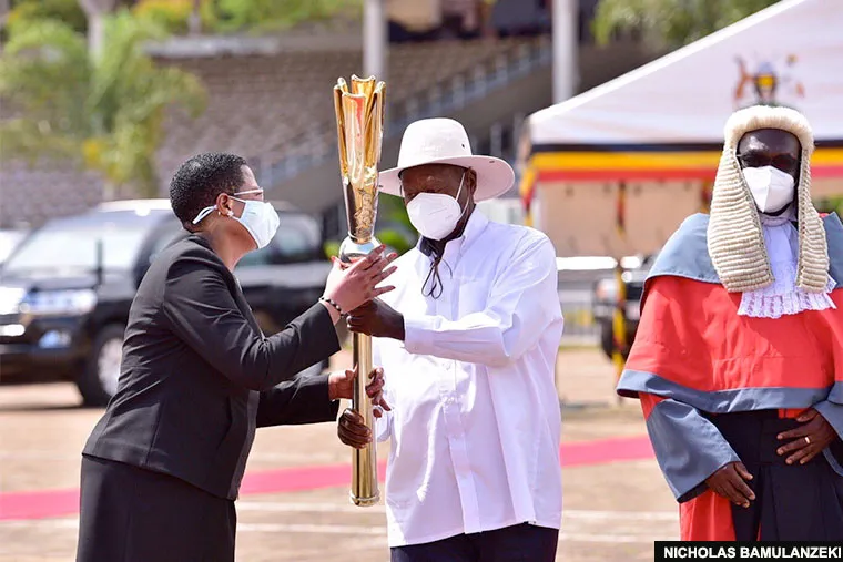 Museveni hands over the mase to Anita AMong